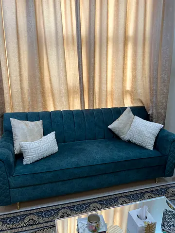 Elegant Teal Sofa with Cushions