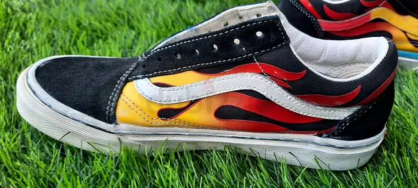 Vans flames old school .One side customised. (No laces). EU 38.5. Negotiable