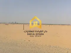 Residential land for sale directly on a park, two adjacent plots near a mosque in Al-Matraq, a prime