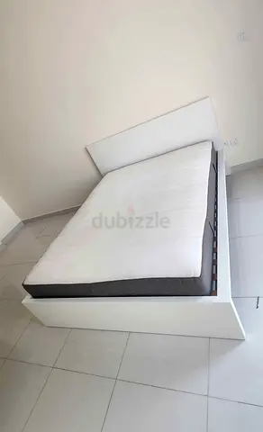 IKEA malam king‑size bed (180 × 200 cm) with an IKEA mattress