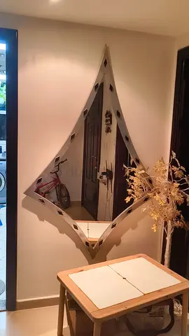Elegant Diamond-Shaped Mirror for Your Living Space