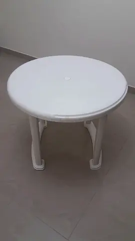 Outdoor white round plastic table