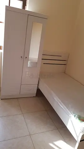 Brand new single bed with wardrobe