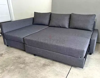Ikea L Shape Sofa cum bed with big storage in L
