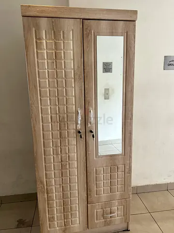 Hi I want to sale 2 door cabinet brand new