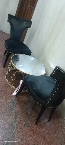 Chic Black Velvet Chairs with Stylish Coffee Table