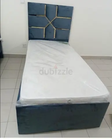 Wooden single bed available