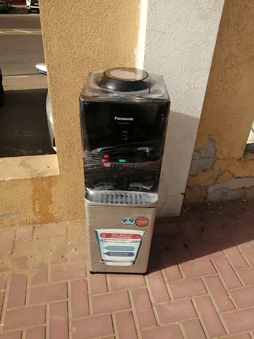 Top load water dispenser