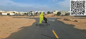 CORNER RESIDENTIAL G+2 PLOT FOR SALE IN AL HELIO 2 , AJMAN , READY ASPHALT STREETS , READY FOR CONST