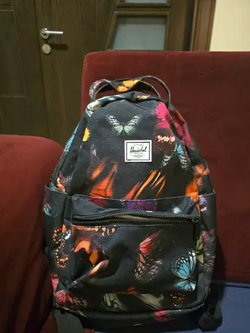 Stylish Herschel Backpack with Butterfly Print