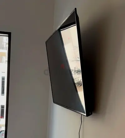 Sleek 65” Flat Panel LED TV - Model No KD-65X75AK