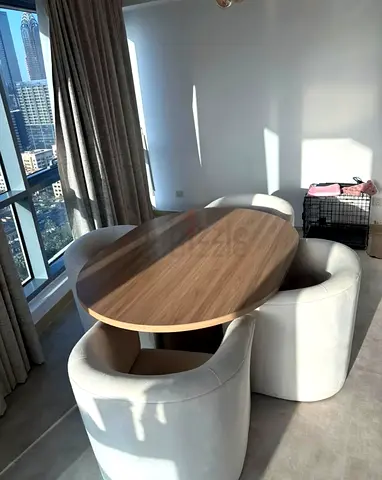 Modern Oval Dining Table with Stylish Chairs