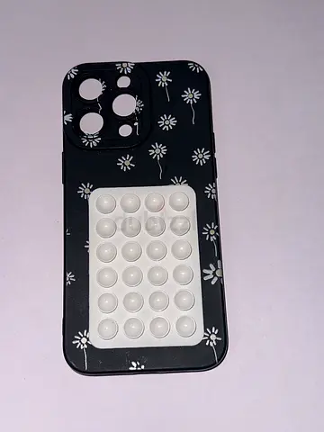 Stylish Floral Phone Case for iPhone 14 pro max with attached octobuddy sticker