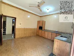 A spacious and well-located villa is available for rent in Al Rawda 2, offering a quiet residential