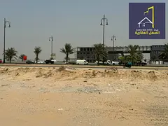 Te koop: kommersiële grond in die Mouilah-gebied, Al Falah-kamp.