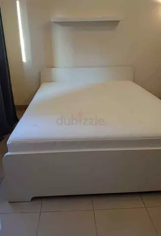 Ikea queen size askovol bed frame and Ikea mattress