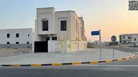 Luxury corner villa in Al Helio 2, Ajman, ready for immediate occupancy with high-end finishes and s