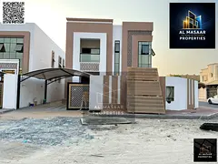 Luxury villa for sale in Ajman with 5 master bedrooms + 2 living rooms, including electricity, water
