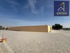 A plot of land for sale in the old Al Sajaa area.