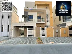 Luxury villa for sale in Al Helio - Ajman | With a swimming pool, roof, and spacious outdoor seating