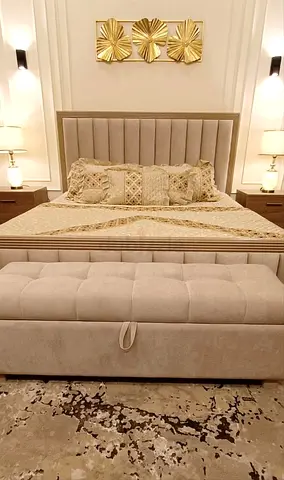 Elegant Bed with Storage Ottoman and Complementary Decor