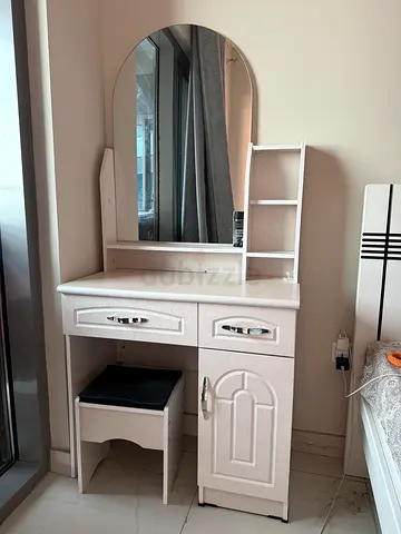 Elegant Light-colored Dresser with Mirror