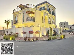 Luxury villa for sale with swimming pool in Al Bahia – Ajman | Corner of two streets