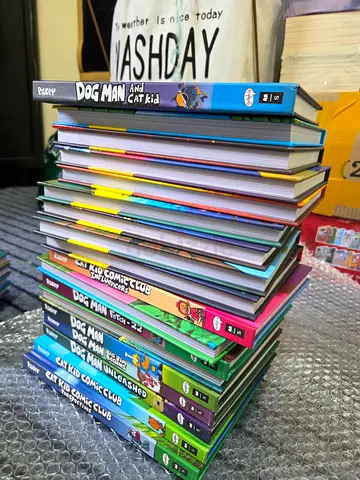 Collection of Dog Man and Cat Kid Books 18 booms
