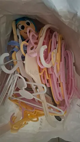 Assorted baby clothes hangers