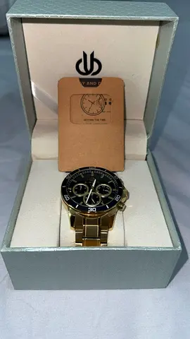Stunning Gold and Black Chronograph Watch
