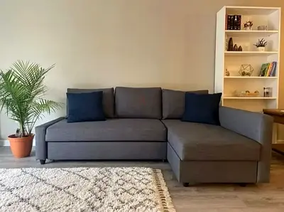 Cozy L-Shaped Sofa bed in Gray with Comfortable Cushions