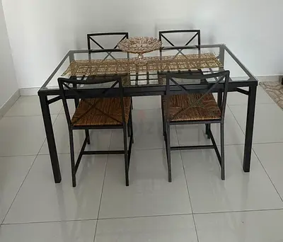 Stylish Glass Dining Table with Woven Chairs