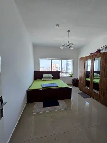 1 Room for sharing with a bachelor guy in qasmia.