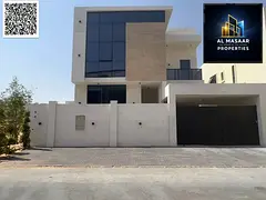 Luxury villa for sale in Al Yasmin area, 5 master bedrooms, price includes registration and ownershi