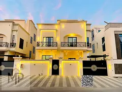 A luxurious two-story villa with a modern design, featuring six master bedrooms, an elegant majlis,