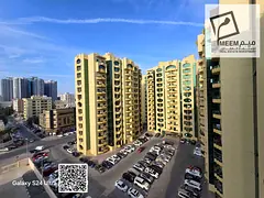 Two-bedroom apartment with a living room for sale in Al Rashidiya Towers, freehold ownership for all