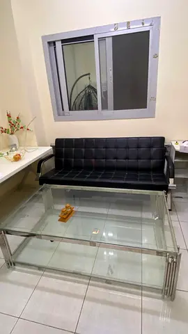 Sleek Modern Black Sofa and Glass Coffee Table Set