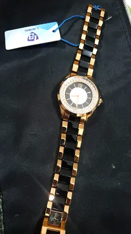 Elegant Black and Gold Watch