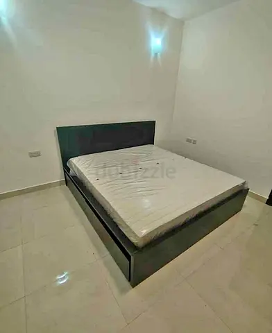 IKEA malam king‑size bed (180 × 200 cm) with 2 storage drawers underneath and an IKEA mattress