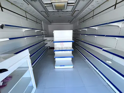 Modern Retail Display Shelves  Counters – Must Sell Urgently  رفوف عرض وكاونترات للبيع – مستعجل