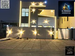 Luxury villa in Lahliu - Ajman | Next to the mosque | Two floors + roof | 4 master bedrooms + majlis