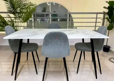 Stylish Marble Dining Table with Modern Chairs