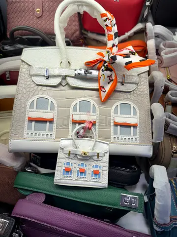 Chic White Handbag with Unique Design