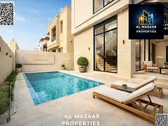 Luxury villa in Al Yasmin with a swimming pool and views of Al Hamidiya Park, ready for immediate oc