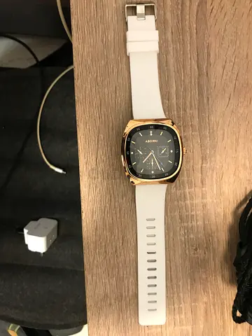 Stylish Gold and Black Watch with White Band