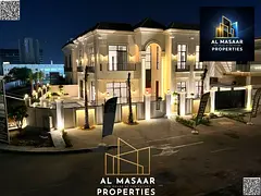 Luxury villa in Al Yasmin with a swimming pool and views of Al Hamidiya Park, ready for immediate oc