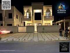 A luxurious villa with a classic design in a prime location opposite Azha Compound, priced including