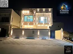 Villa in a prime location in Al Yasmin, directly behind Al Hamidiya Park, with a rooftop terrace, an