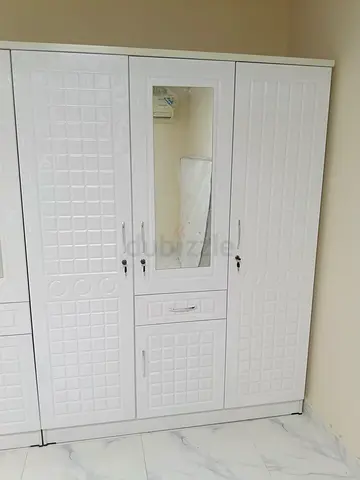 Elegant White Wardrobe with Mirror