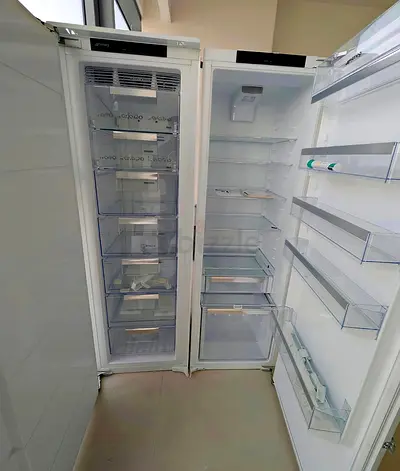 Smeg brand new built in separate fridge and freezer set